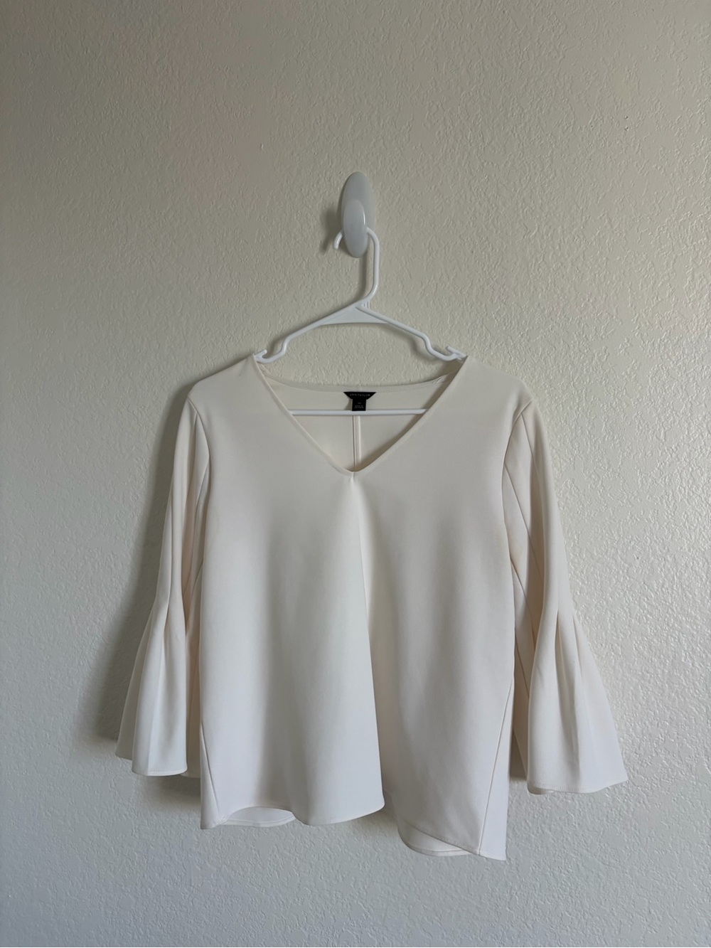 Ann Taylor V-Neck Bell Sleeve Top in Cream